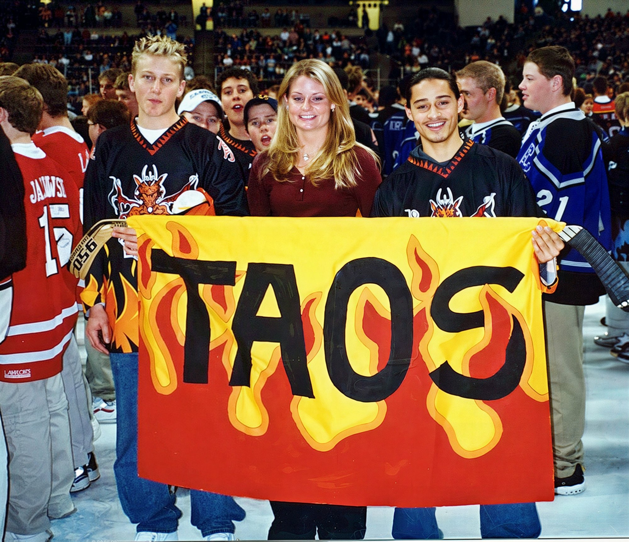 Derrick Gerhardt and Carlos Abeyta with a cute girl they found.