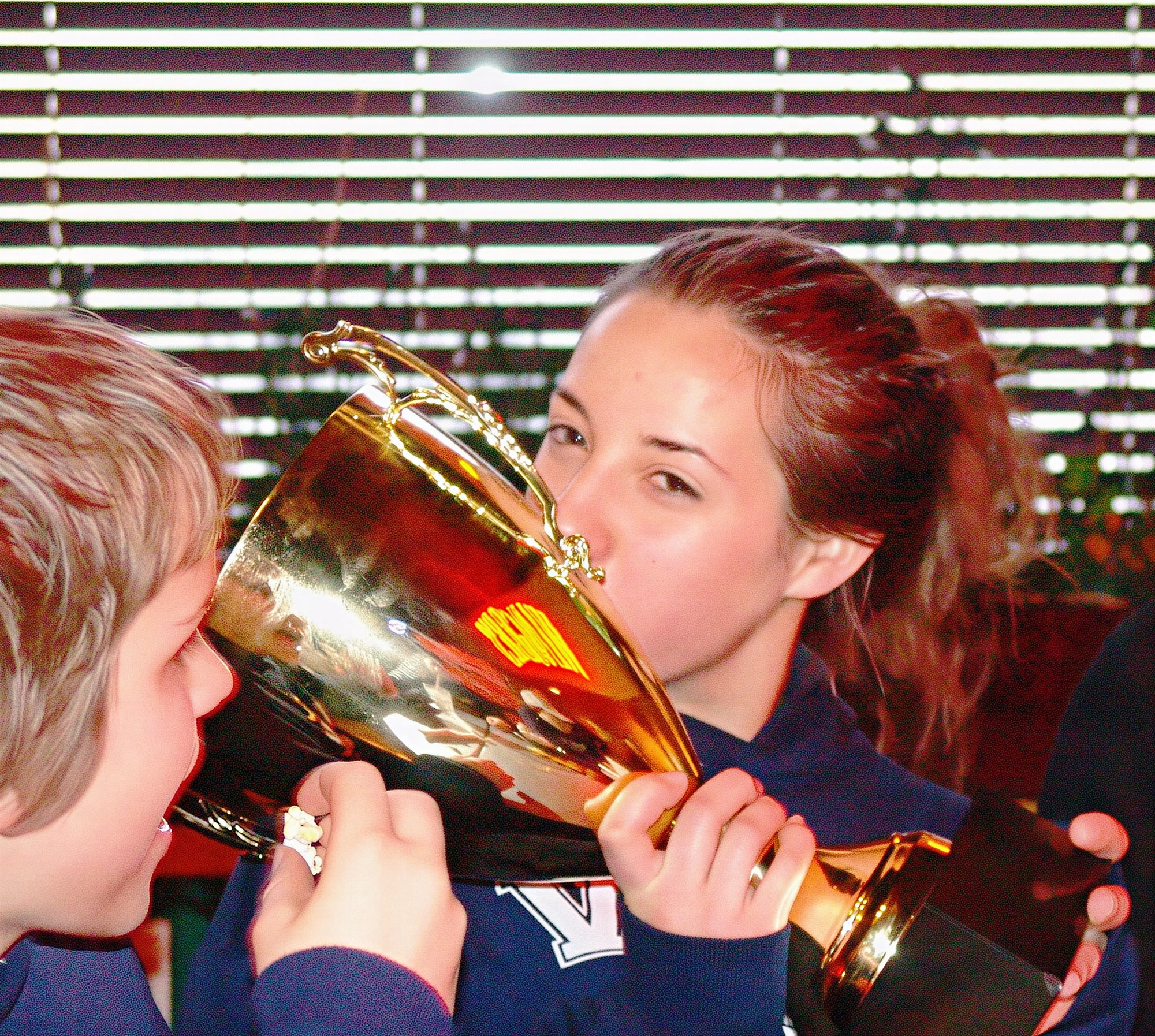 Mckenzie Stevens earned the right to kiss the cup by playing tough defense all tournament.