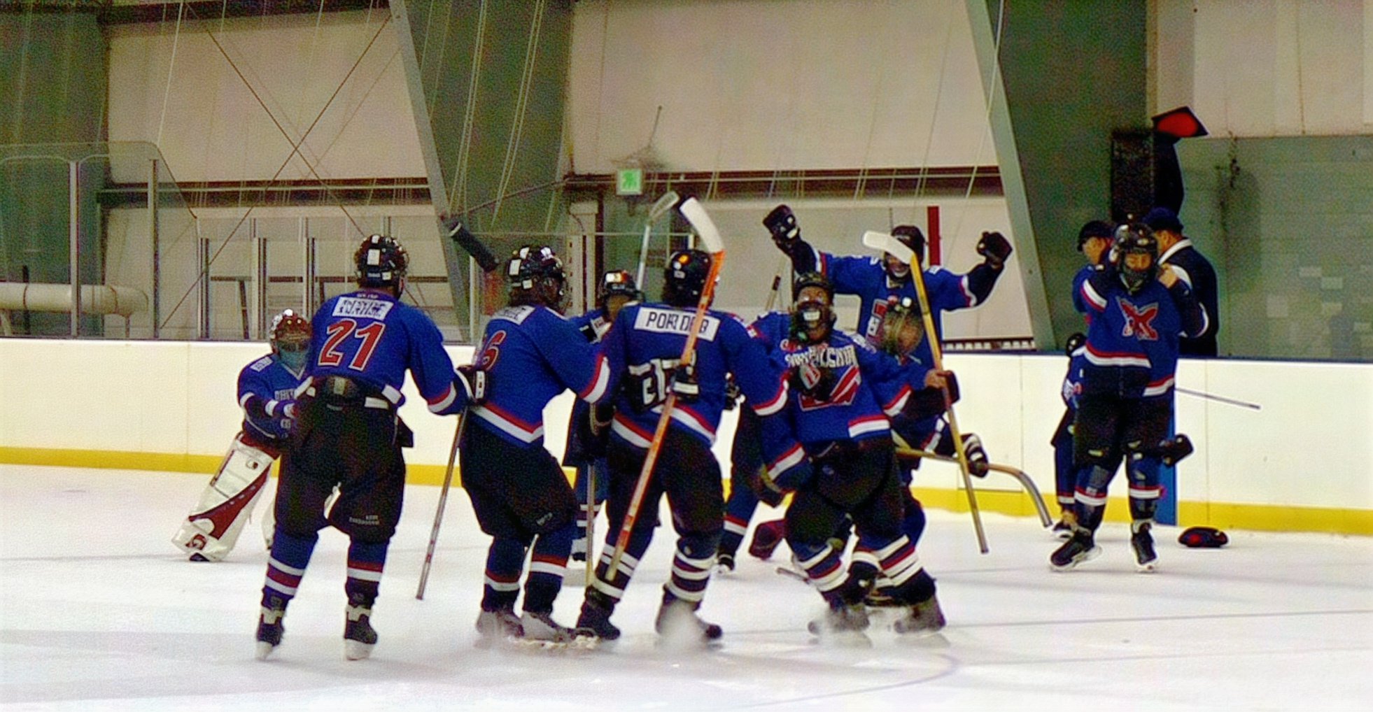 Happy players after overtime goal