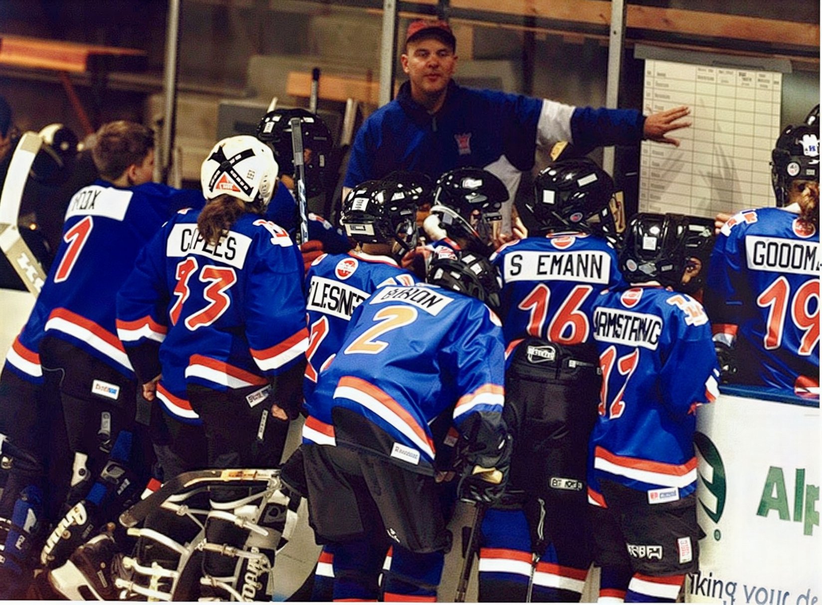 Coach Barry explaining the "hit board".   You got one point for a bump, 2 for a solid hit and 3 for a "clobber".   -1 for a penalty.   We probably had 100 points total - the other team wasn't sure what was going on.