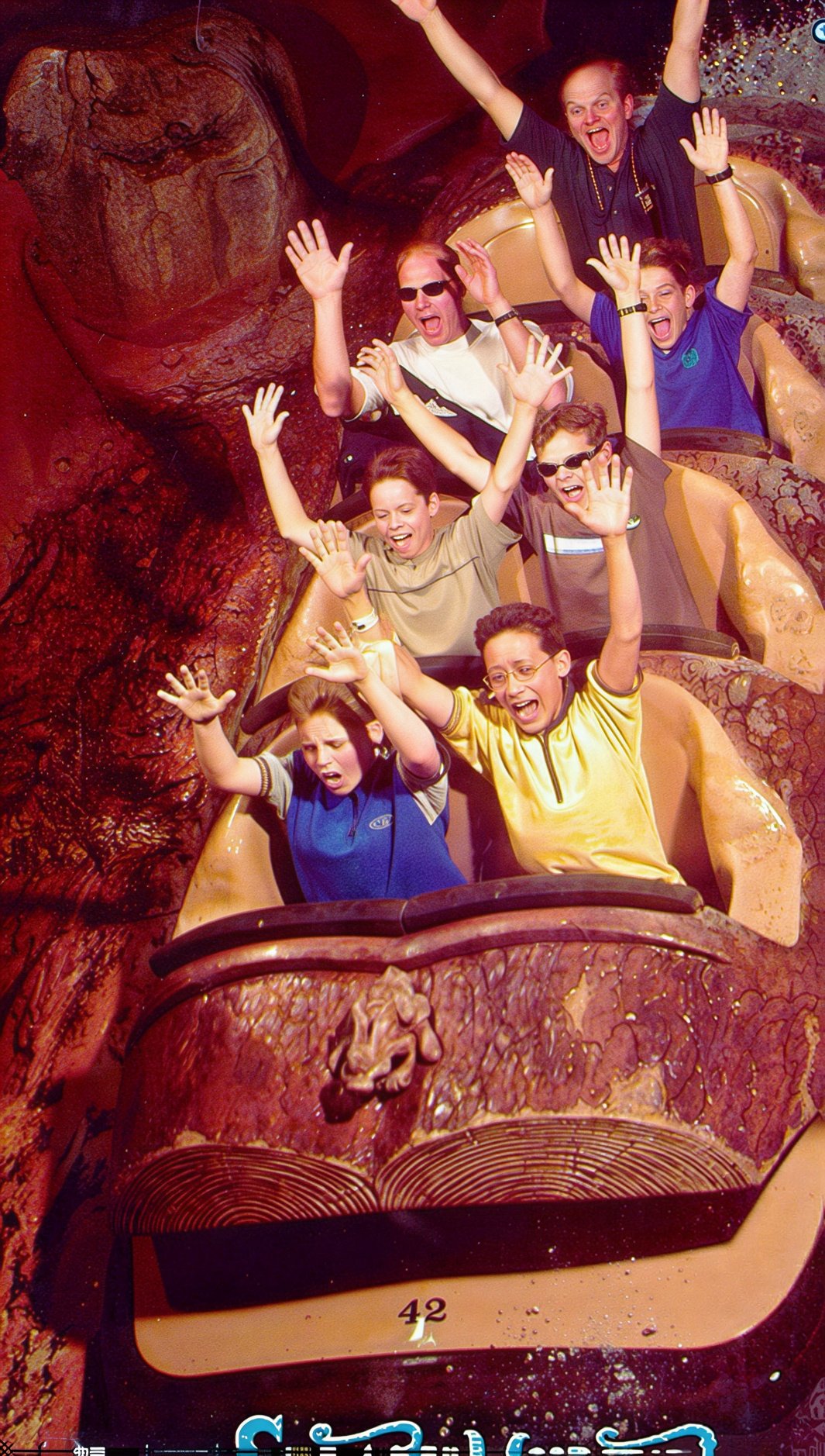 Roller coaster at Universal Studios  That is coach Barry in the back with the hands up.  We also have Dad Scott Somes, Coulter Somes, Alex Biegler, Austi Chow, Mike Garman