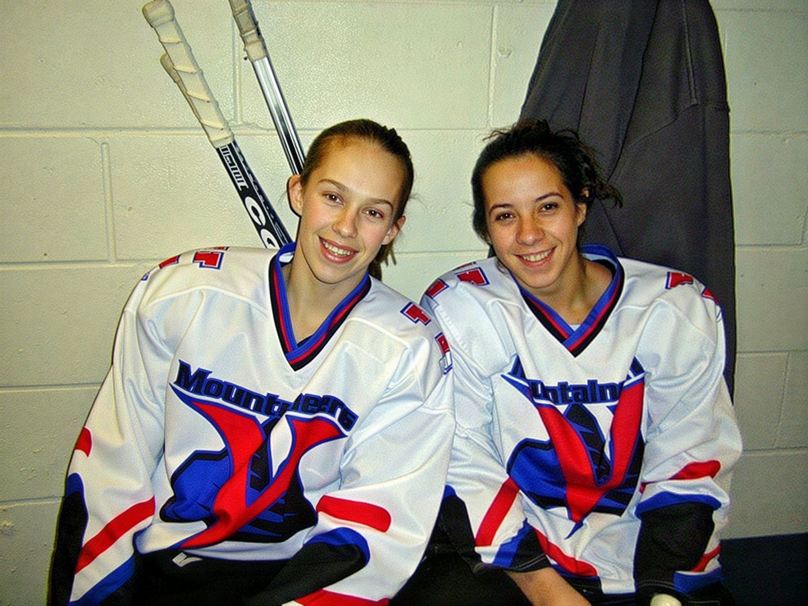 Molly Goodman on the left with Mckenzie Stevens.   There is full body checking in Bantams and these two were tough to knock down.